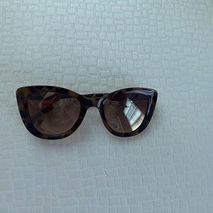 Cat Eye Tortoise Sunglasses with mirrored lens.